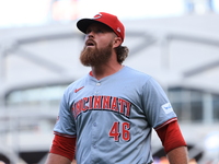 Cincinnati Reds pitcher Buck Farmer #46 comes off the field during the eighth inning of the baseball game against the New York Mets at Citi...