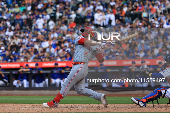 Cincinnati Reds' Ty France #2 singles during the ninth inning of the baseball game against the New York Mets at Citi Field in Corona, New Yo...