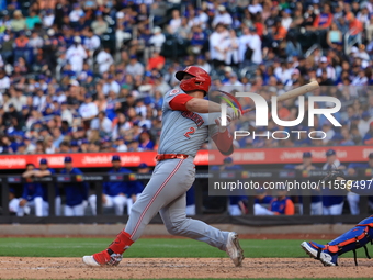 Cincinnati Reds' Ty France #2 singles during the ninth inning of the baseball game against the New York Mets at Citi Field in Corona, New Yo...