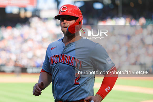 Cincinnati Reds' Ty France #2 heads towards the dugout after scoring during the ninth inning of the baseball game against the New York Mets...