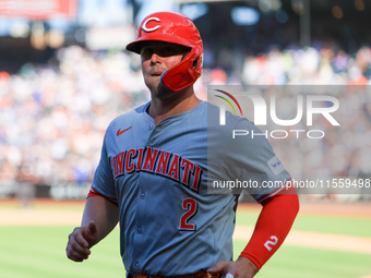 Cincinnati Reds' Ty France #2 heads towards the dugout after scoring during the ninth inning of the baseball game against the New York Mets...