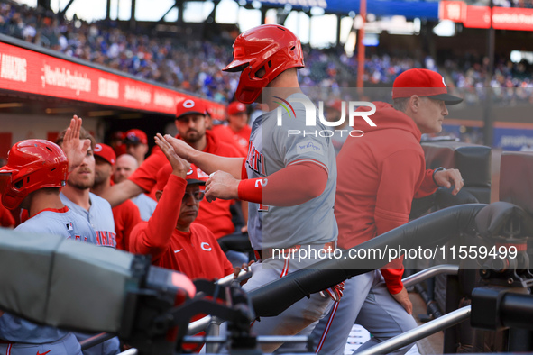 Cincinnati Reds' Ty France #2 heads towards the dugout after scoring during the ninth inning of the baseball game against the New York Mets...