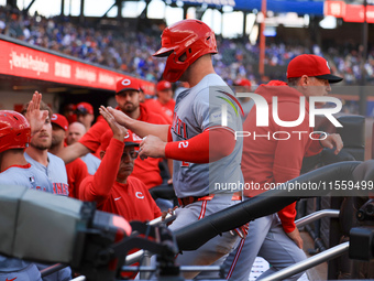 Cincinnati Reds' Ty France #2 heads towards the dugout after scoring during the ninth inning of the baseball game against the New York Mets...