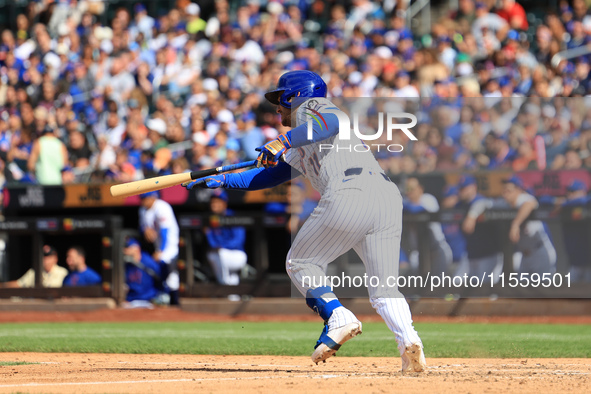 New York Mets' Jose Iglesias #11 bats during the sixth inning of the baseball game against the Cincinnati Reds at Citi Field in Corona, New...