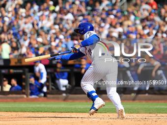 New York Mets' Jose Iglesias #11 bats during the sixth inning of the baseball game against the Cincinnati Reds at Citi Field in Corona, New...