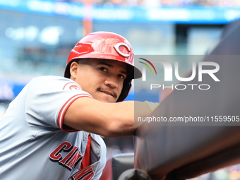 Cincinnati Reds Noelvi Marte #16 stands on the dugout steps waiting for his chance to bat during the seventh inning of the baseball game aga...