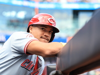 Cincinnati Reds Noelvi Marte #16 stands on the dugout steps waiting for his chance to bat during the seventh inning of the baseball game aga...