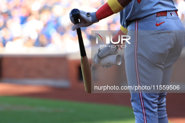 Noelvi Marte #16 of the Cincinnati Reds stands on deck during the ninth inning of the baseball game against the New York Mets at Citi Field...