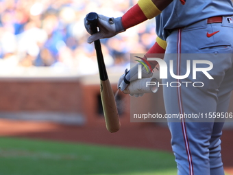 Noelvi Marte #16 of the Cincinnati Reds stands on deck during the ninth inning of the baseball game against the New York Mets at Citi Field...