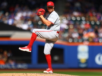 Cincinnati Reds pitcher Emilio Pagan #15 throws during the sixth inning of the baseball game against the New York Mets at Citi Field in Coro...