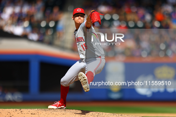 Cincinnati Reds pitcher Emilio Pagan #15 throws during the sixth inning of the baseball game against the New York Mets at Citi Field in Coro...