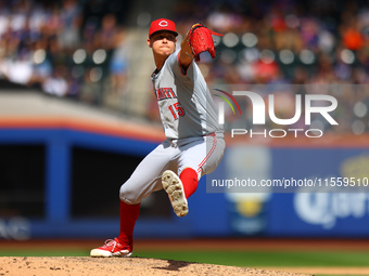 Cincinnati Reds pitcher Emilio Pagan #15 throws during the sixth inning of the baseball game against the New York Mets at Citi Field in Coro...