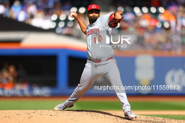 Cincinnati Reds pitcher Tony Santillan #64 throws during the fifth inning of the baseball game against the New York Mets at Citi Field in Co...