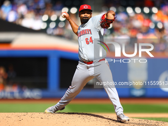 Cincinnati Reds pitcher Tony Santillan #64 throws during the fifth inning of the baseball game against the New York Mets at Citi Field in Co...