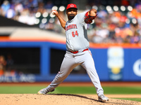 Cincinnati Reds pitcher Tony Santillan #64 throws during the fifth inning of the baseball game against the New York Mets at Citi Field in Co...