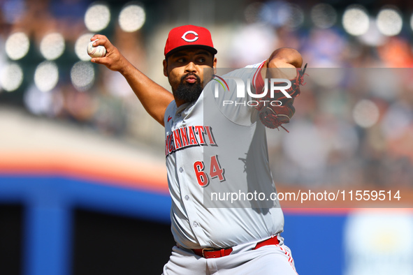 Cincinnati Reds pitcher Tony Santillan #64 throws during the fifth inning of the baseball game against the New York Mets at Citi Field in Co...