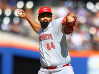 Cincinnati Reds pitcher Tony Santillan #64 throws during the fifth inning of the baseball game against the New York Mets at Citi Field in Co...