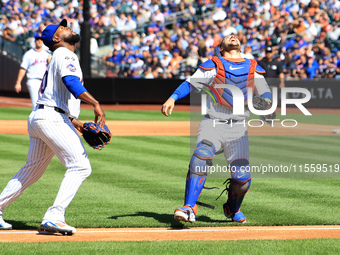 New York Mets catcher Luis Torrens #13 makes a catch during the fourth inning of the baseball game against the Cincinnati Reds at Citi Field...