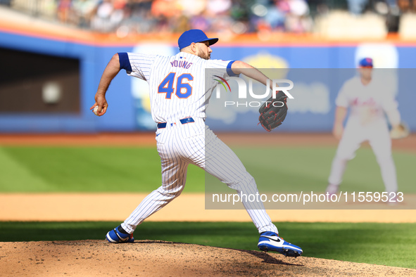 New York Mets relief pitcher Alex Young #46 throws during the ninth inning of the baseball game against the Cincinnati Reds at Citi Field in...