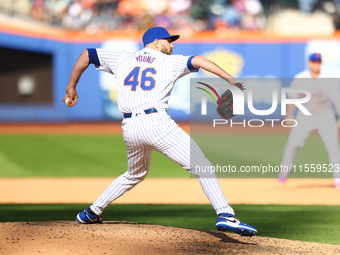 New York Mets relief pitcher Alex Young #46 throws during the ninth inning of the baseball game against the Cincinnati Reds at Citi Field in...