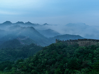 Clouds linger over the Jinshanling Great Wall after rain in Chengde, China, on September 8, 2024. (