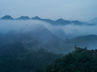 Clouds linger over the Jinshanling Great Wall after rain in Chengde, China, on September 8, 2024. (