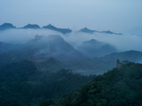 Clouds linger over the Jinshanling Great Wall after rain in Chengde, China, on September 8, 2024. (