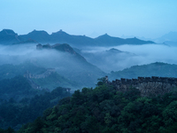 Clouds linger over the Jinshanling Great Wall after rain in Chengde, China, on September 8, 2024. (