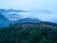 Clouds linger over the Jinshanling Great Wall after rain in Chengde, China, on September 8, 2024. (