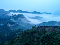 Clouds linger over the Jinshanling Great Wall after rain in Chengde, China, on September 8, 2024. (