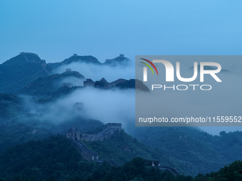 Clouds linger over the Jinshanling Great Wall after rain in Chengde, China, on September 8, 2024. (