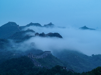 Clouds linger over the Jinshanling Great Wall after rain in Chengde, China, on September 8, 2024. (