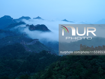 Clouds linger over the Jinshanling Great Wall after rain in Chengde, China, on September 8, 2024. (