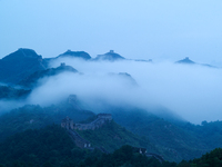 Clouds linger over the Jinshanling Great Wall after rain in Chengde, China, on September 8, 2024. (