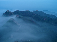 Clouds linger over the Jinshanling Great Wall after rain in Chengde, China, on September 8, 2024. (