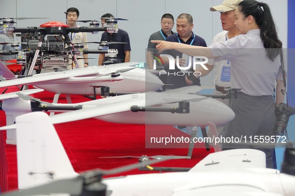 Visitors learn about drone products at an exhibition in Yantai, China, on September 5, 2024. According to the Ministry of Industry and Infor...