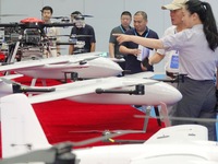 Visitors learn about drone products at an exhibition in Yantai, China, on September 5, 2024. According to the Ministry of Industry and Infor...