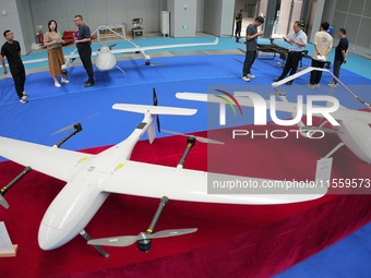 Visitors learn about drone products at an exhibition in Yantai, China, on September 5, 2024. According to the Ministry of Industry and Infor...