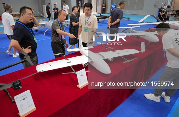 Visitors learn about drone products at an exhibition in Yantai, China, on September 5, 2024. According to the Ministry of Industry and Infor...