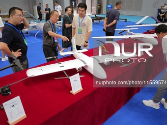 Visitors learn about drone products at an exhibition in Yantai, China, on September 5, 2024. According to the Ministry of Industry and Infor...