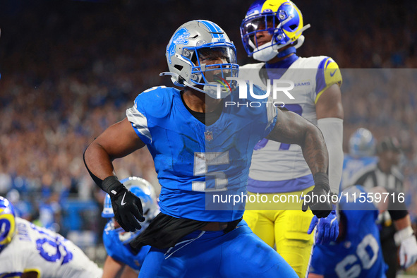 DETROIT,MICHIGAN-SEPTEMBER 8: Detroit Lions running back David Montgomery (5) celebrates after scoring a touchdow during overtime of an NFL...