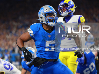 DETROIT,MICHIGAN-SEPTEMBER 8: Detroit Lions running back David Montgomery (5) celebrates after scoring a touchdow during overtime of an NFL...