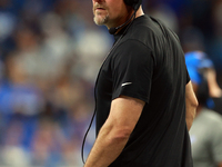 DETROIT,MICHIGAN-SEPTEMBER 8: Detroit Lions head coach Dan Campbell looks on from the sidelines  during a game between the Detroit Lions and...