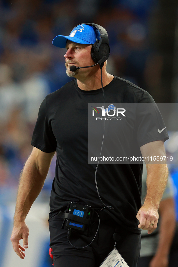 DETROIT,MICHIGAN-SEPTEMBER 8: Detroit Lions head coach Dan Campbell walks on the sidelines  during a game between the Detroit Lions and the...