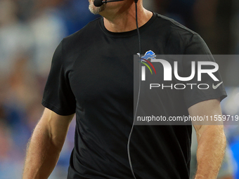 DETROIT,MICHIGAN-SEPTEMBER 8: Detroit Lions head coach Dan Campbell walks on the sidelines  during a game between the Detroit Lions and the...