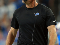 DETROIT,MICHIGAN-SEPTEMBER 8: Detroit Lions head coach Dan Campbell walks on the sidelines  during a game between the Detroit Lions and the...