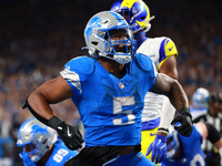 DETROIT,MICHIGAN-SEPTEMBER 8: Detroit Lions running back David Montgomery (5) celebrates after scoring a touchdow during overtime of an NFL...