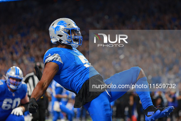 DETROIT,MICHIGAN-SEPTEMBER 8: Detroit Lions running back David Montgomery (5) celebrates after scoring a touchdow during overtime of an NFL...