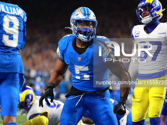 DETROIT,MICHIGAN-SEPTEMBER 8: Detroit Lions running back David Montgomery (5) celebrates after scoring a touchdow during overtime of an NFL...