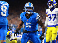 DETROIT,MICHIGAN-SEPTEMBER 8: Detroit Lions running back David Montgomery (5) celebrates after scoring a touchdow during overtime of an NFL...